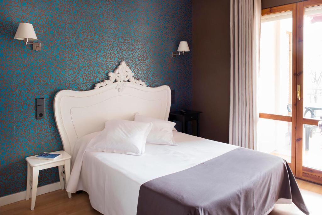 Hospedium Hostal Un Punto Chic Уэска Номер фото