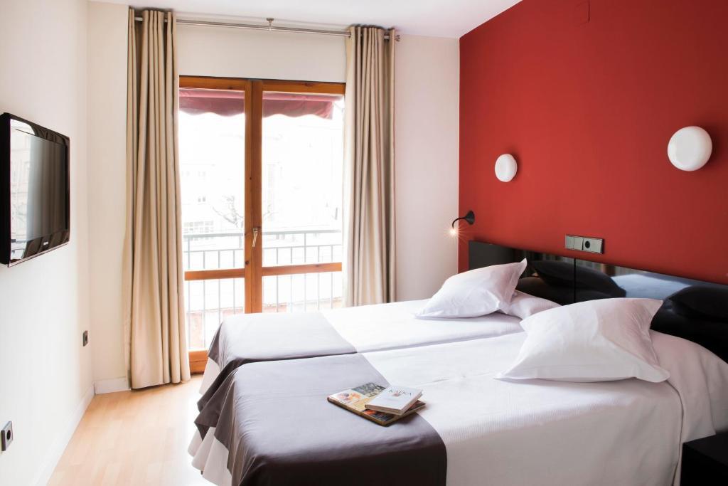 Hospedium Hostal Un Punto Chic Уэска Номер фото
