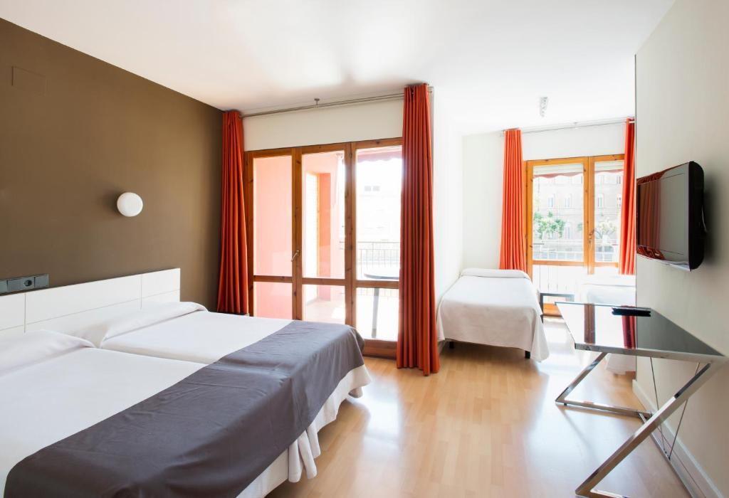 Hospedium Hostal Un Punto Chic Уэска Экстерьер фото
